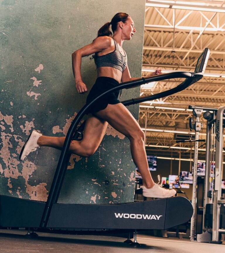 Member running on cardio equipment at Gold’s Gym Greeley fitness center in Colorado.