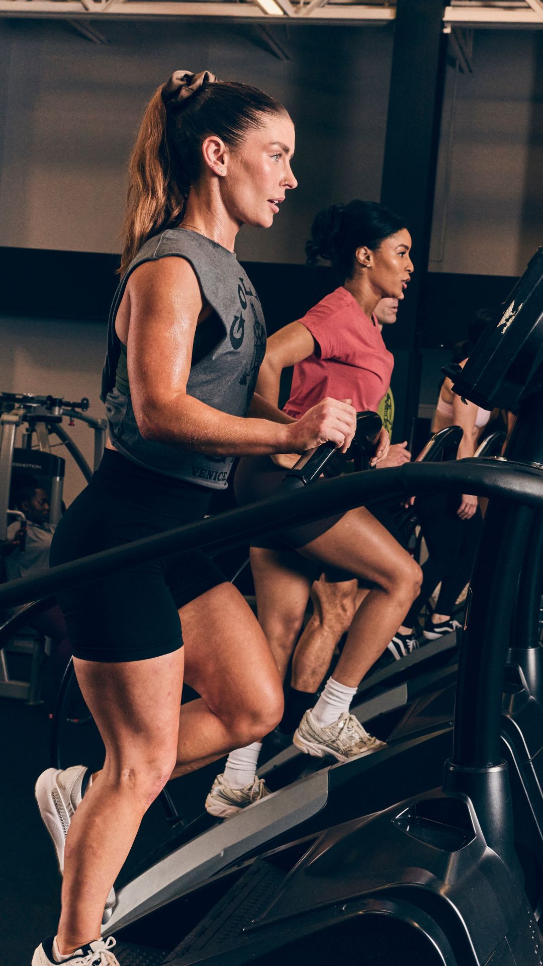 Gold's Gym Greeley members training on stair climber cardio machines