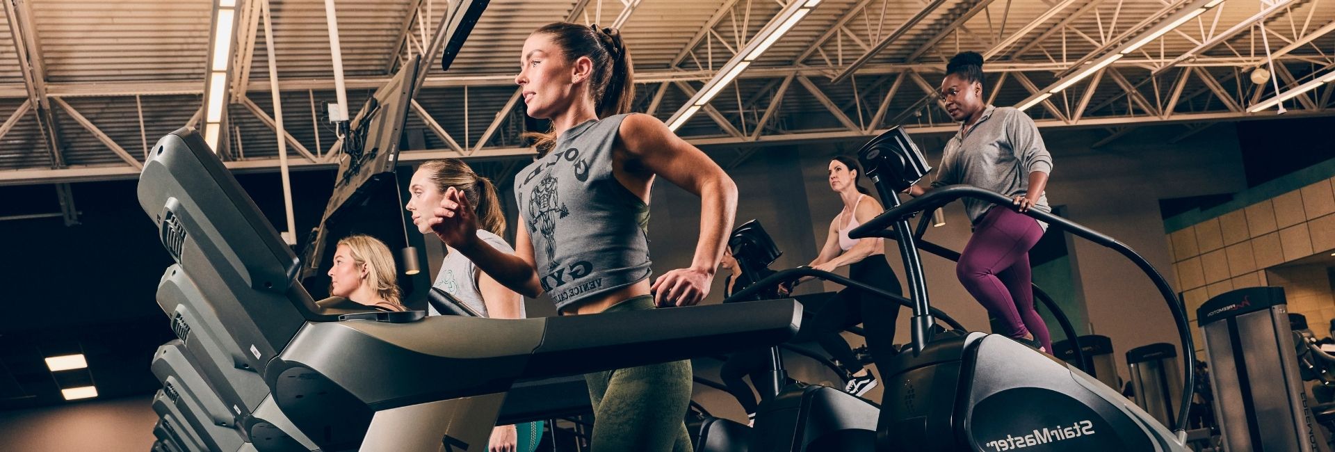Members using treadmills and cardio equipment at Gold’s Gym Colorado fitness center.