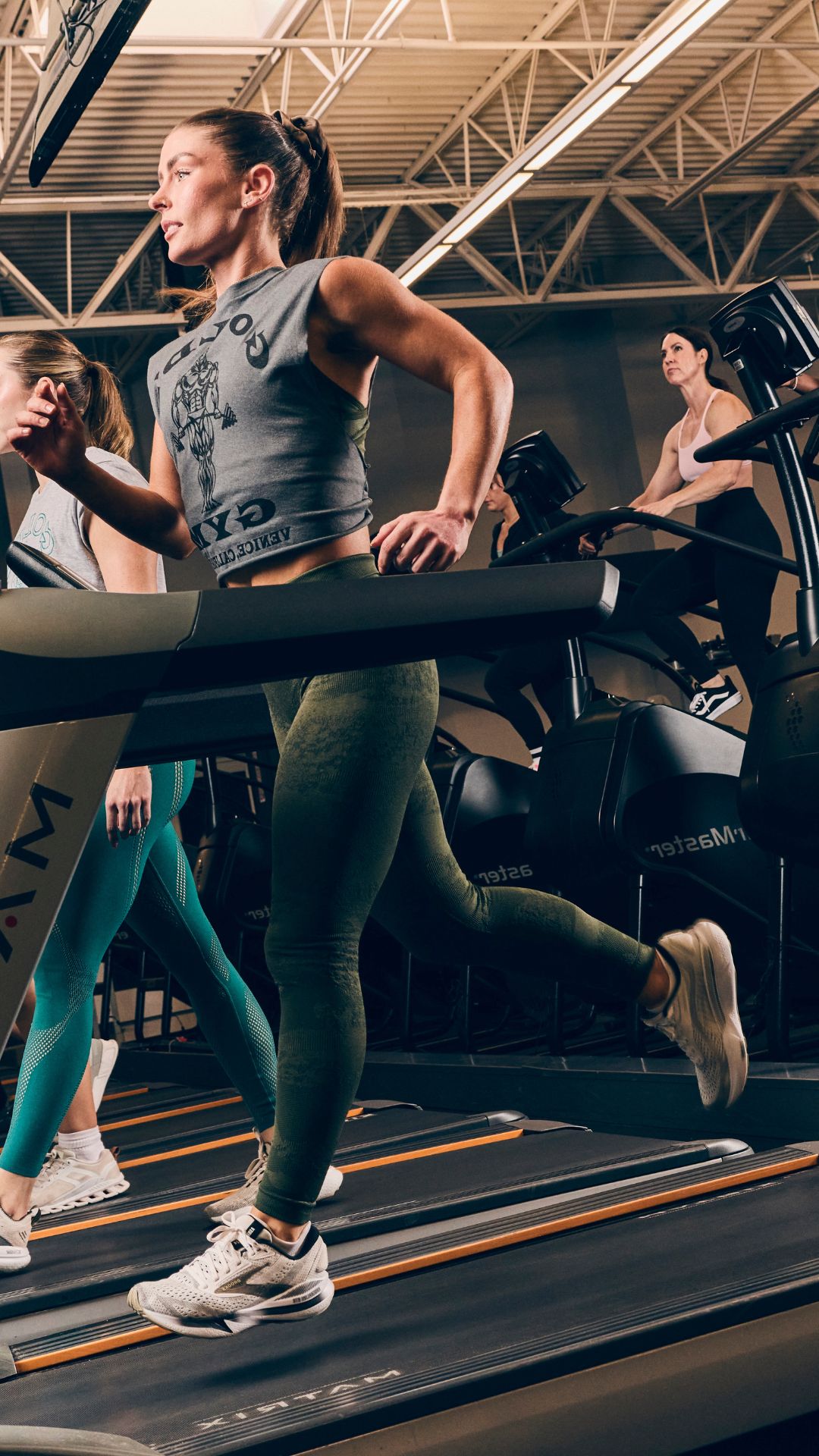 Members using treadmills and cardio equipment at Gold’s Gym Colorado fitness center