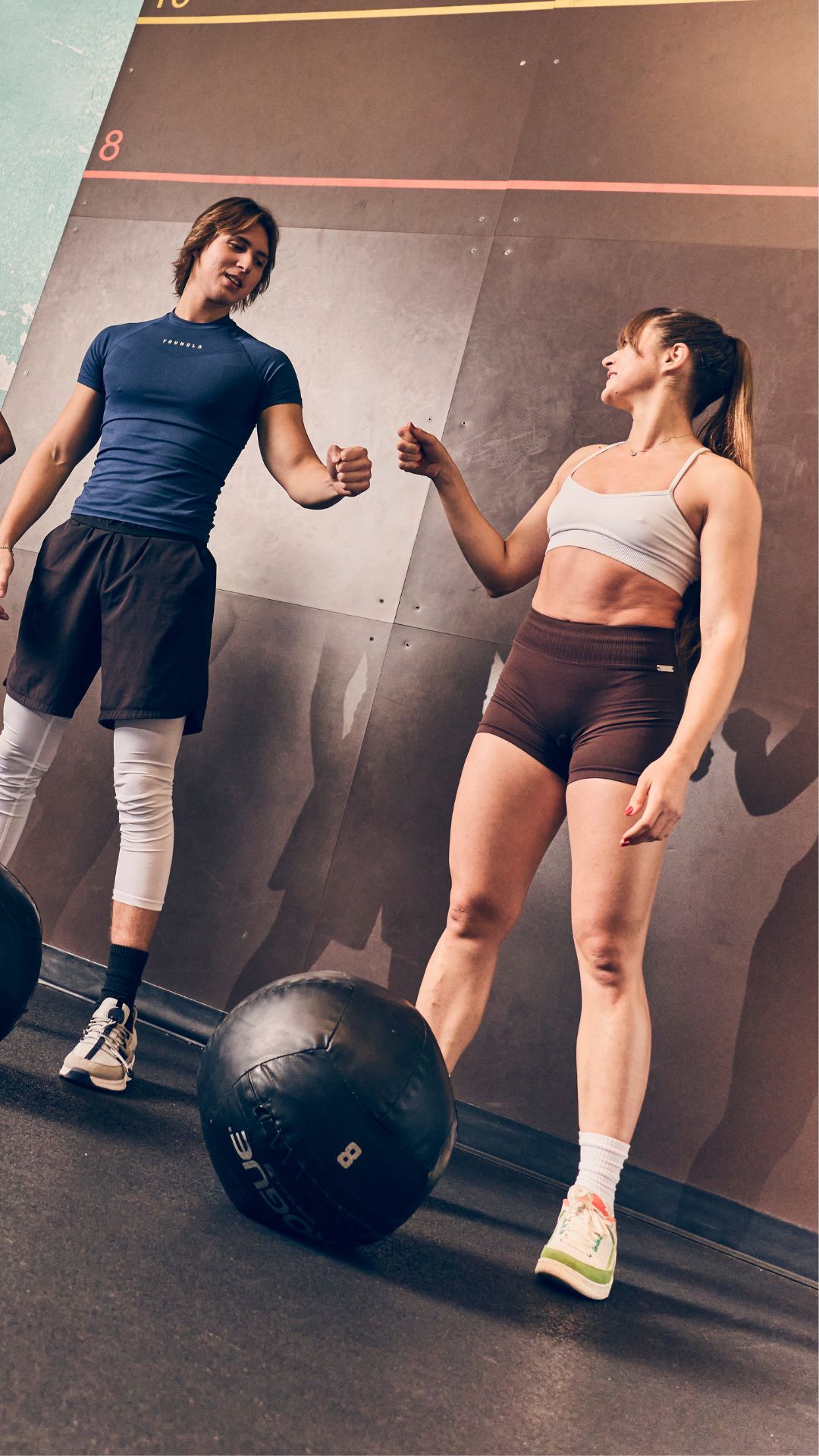 Members celebrating after a workout at Gold’s Gym Arvada, highlighting the gym’s supportive fitness community and training atmosphere.